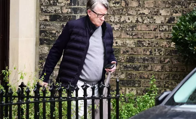 Peter Mandelson is seen outside his home in north west London, Saturday, Feb. 21, 2026. (James Manning/PA via AP)