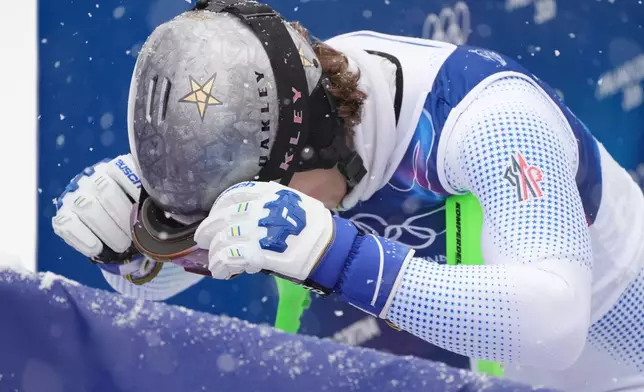 Brazil's Lucas Pinheiro Braathen reacts at the finish area of an alpine ski, men's slalom race, at the 2026 Winter Olympics, in Bormio, Italy, Monday, Feb. 16, 2026. (AP Photo/Rebecca Blackwell)
