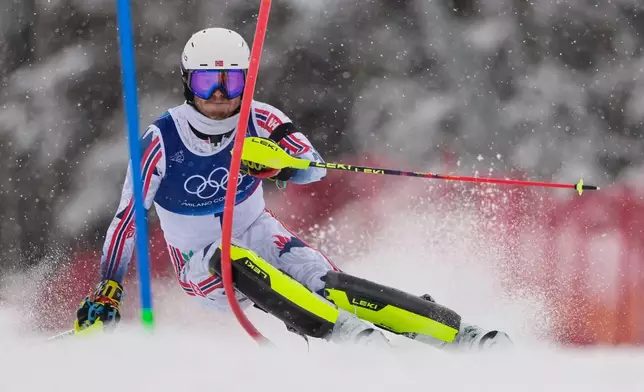 Norway's Atle Lie McGrath speeds down the course, during an alpine ski, men's slalom race, at the 2026 Winter Olympics, in Bormio, Italy, Monday, Feb. 16, 2026. (AP Photo/John Locher)