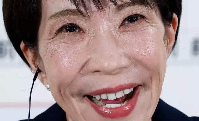 Sanae Takaichi, center, Japan's prime minister and president of the ruling Liberal Democratic Party (LDP), speaks during an interview at the LDP headquarters Sunday, Feb. 8, 2026 in Tokyo. (Kim Kyung-Hoon/Pool Photo via AP)