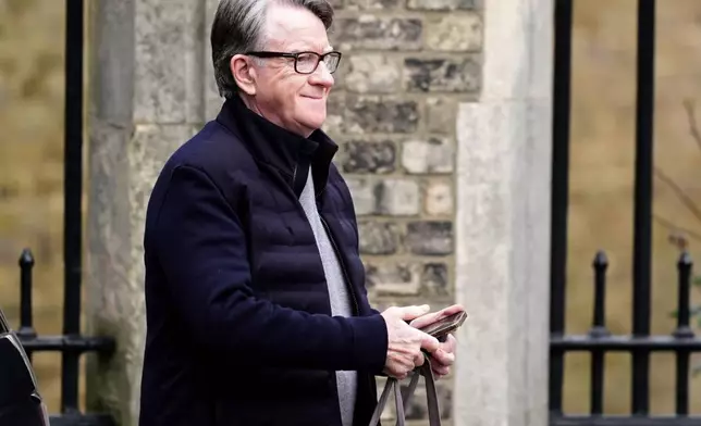Peter Mandelson is seen outside his home in north west London, Saturday, Feb. 21, 2026. (James Manning/PA via AP)