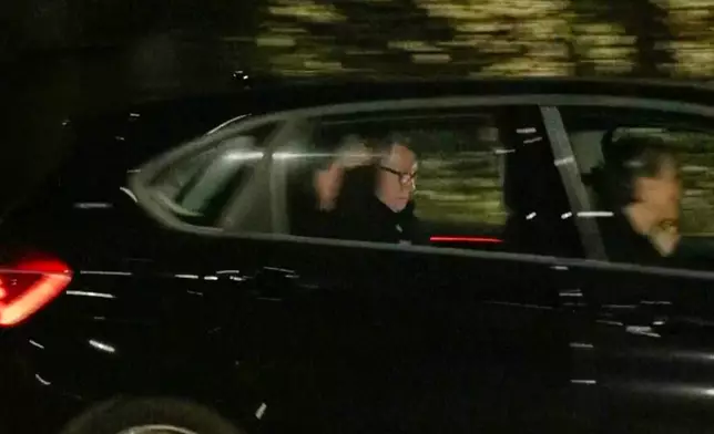 In this photo taken from video by Sky News, Britain's former ambassador to the U.S. Peter Mandelson is seen in a vehicle leaving a police station in London in the early hours of Tuesday, Feb. 24, 2026. (Sky News Exclusive via AP)