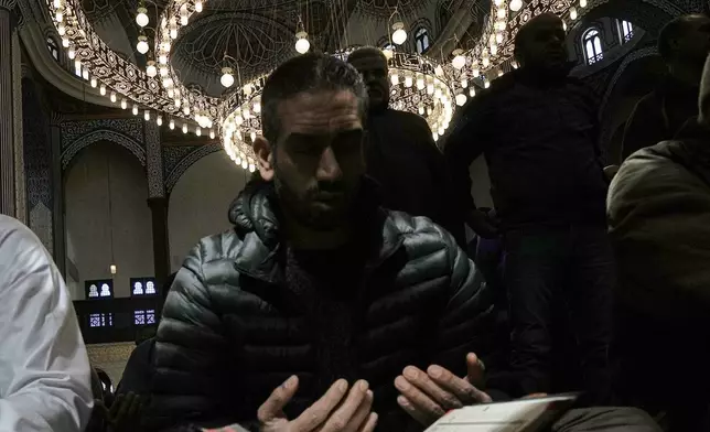 FILE - A worshiper prays during the Muslim fasting month of Ramadan at Al Rahman mosque in Cairo, Egypt, Feb. 20, 2026. (AP Photo/Amr Nabil, File)