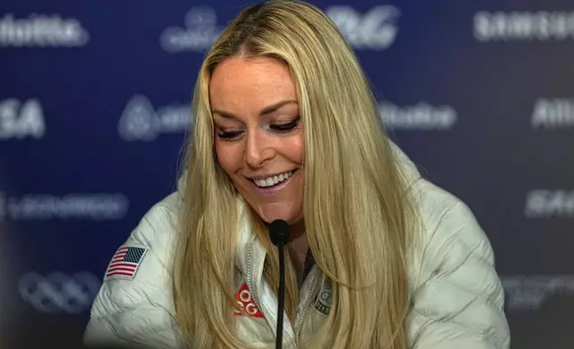 United States' Lindsey Vonn attends a press conference by the U.S. ski team at the 2026 Winter Olympics, in Cortina d'Ampezzo, Italy, Tuesday, Feb. 3, 2026. (AP Photo/Fatima Shbair)