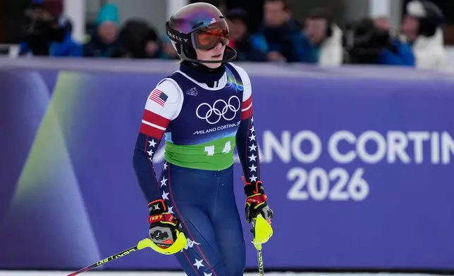 United States' Mikaela Shiffrin reacts at the finish area of an alpine ski, women's team combined race, at the 2026 Winter Olympics, in Cortina d'Ampezzo, Italy, Tuesday, Feb. 10, 2026. (AP Photo/Andy Wong)