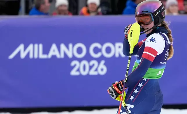 United States' Mikaela Shiffrin at the finish area during an alpine ski, slalom portion of a women's team combined race, at the 2026 Winter Olympics, in Cortina d'Ampezzo, Italy, Tuesday, Feb. 10, 2026. (AP Photo/Robert F. Bukaty)