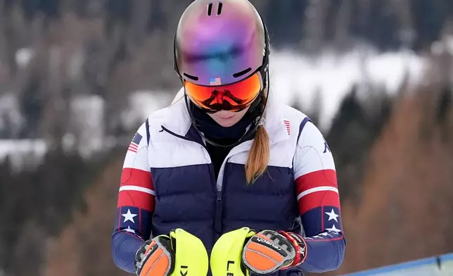 United States' Mikaela Shiffrin concentrates ahead of an alpine ski, women's slalom portion of a team combined race, at the 2026 Winter Olympics, in Cortina d'Ampezzo, Italy, Tuesday, Feb. 10, 2026. (AP Photo/Jacquelyn Martin)