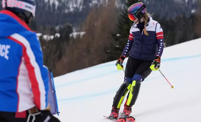 United States' Mikaela Shiffrin concentrates ahead of an alpine ski, women's slalom portion of a team combined race, at the 2026 Winter Olympics, in Cortina d'Ampezzo, Italy, Tuesday, Feb. 10, 2026. (AP Photo/Jacquelyn Martin)
