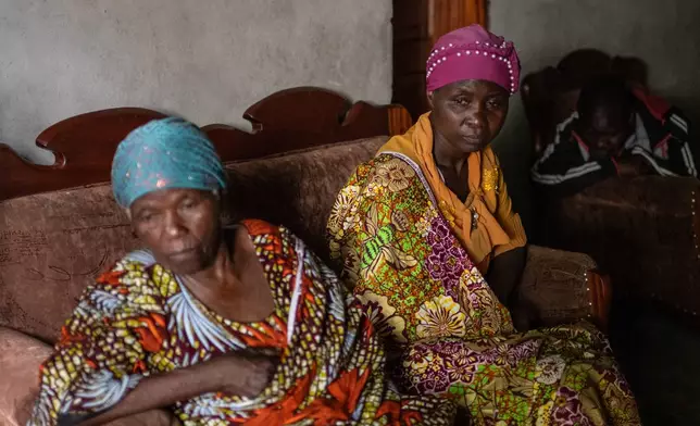 People mourn Nguvumali Kalabosh Bosco, who died when tunnels collapsed at a major coltan mining site due to landslides, in Goma, eastern Congo, Monday, Feb. 2, 2026. (AP Photo/Moses Sawasawa)