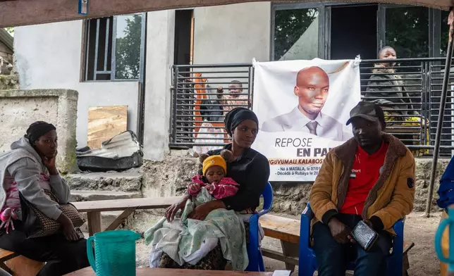 People attend a memorial for Nguvumali Kalabosh Bosco, who died when tunnels collapsed at a major coltan mining site due to landslides, in Goma, eastern Congo, Monday, Feb. 2, 2026. (AP Photo/Moses Sawasawa)