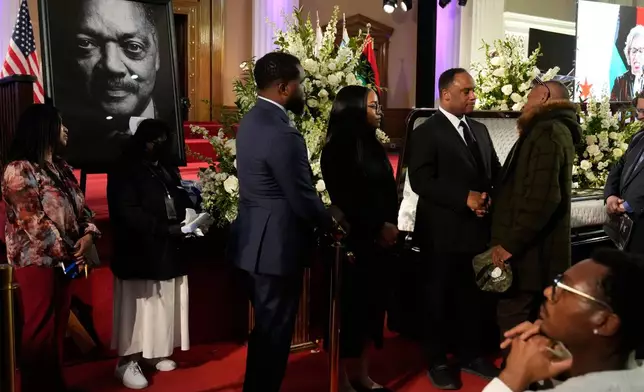 Visitors attend a public visitation for Reverend Jesse Jackson inside Rainbow/PUSH Coalition in Chicago, Friday, Feb. 27, 2026. (AP Photo/Nam Y. Huh)