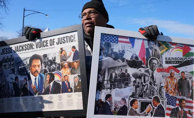 James Hickman holds a photo montage of the late Reverend Jesse Jackson before a public visitation at Rainbow/PUSH Coalition in Chicago, Thursday, Feb. 26, 2026. (AP Photo/Nam Y. Huh)