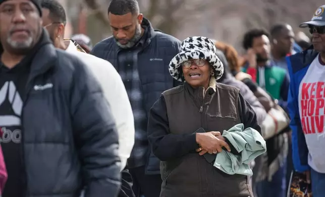 Crystal Beaty waits in line to attend a public visitation for the Rev. Jesse Jackson at Rainbow PUSH Coalition headquarters Friday, Feb. 27, 2026, in Chicago. (AP Photo/Erin Hooley)