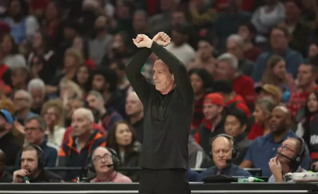 Cleveland Cavaliers head coach Kenny Atkinson reacts during the first half of an NBA basketball game against the Portland Trail Blazers, Sunday, Feb. 1, 2026, in Portland, Ore. (AP Photo/Amanda Loman)