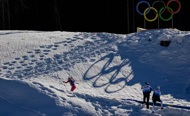 Johannes Hoesflot Klaebo, of Norway, skis uphill during the cross country skiing men's 4 x 7.5km relay at the 2026 Winter Olympics, in Tesero, Italy, Sunday, Feb. 15, 2026. (AP Photo/Matthias Schrader)