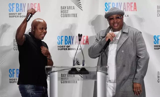 Rappers Too Short, left, and E-40 speak during a Bay Area Host Committee news conference for the NFL Super Bowl football game in San Francisco, Monday, Feb. 2, 2026. (AP Photo/Jeff Chiu)