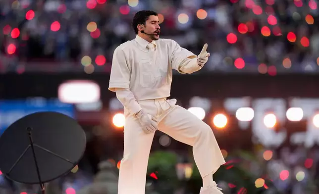 Bad Bunny performs during halftime of the NFL Super Bowl 60 football game between the New England Patriots and the Seattle Seahawks, Sunday, Feb. 8, 2026, in Santa Clara, Calif. (AP Photo/Lynne Sladky)