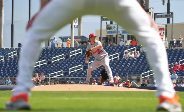 St. Louis Cardinals starting pitcher Kyle Leahy throws during the first inning of a spring training baseball game against the Houston Astros Sunday, Feb. 22, 2026, in West Palm Beach, Fla. (AP Photo/Jeff Roberson)