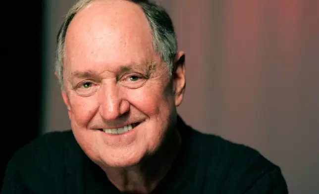 FILE - Recording artist Neil Sedaka poses for a portrait Tuesday, Jan. 26, 2010 in New York. (AP Photo/Jeff Christensen, File)