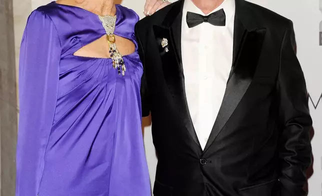 FILE - Composer Neil Sedaka, and his wife, Leba Sedaka, attend the New York City Ballet's gala opening night of Paul McCartney's "Ocean's Kingdom" on Thursday, Sept. 22, 2011 in New York. (AP Photo/Evan Agostini, File)