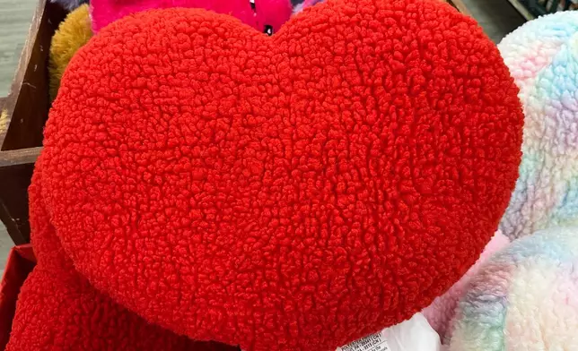 A Valentine heart cushion is seen at a grocery store in Buffalo Grove, Ill., Monday, Feb. 9, 2026. (AP Photo/Nam Y. Huh)