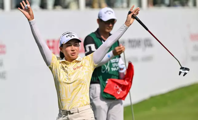 Jeeno Thitikul of Thailand reacts after winning following the final round of the LPGA Honda Thailand golf tournament in Pattaya, Thailand Sunday, Feb. 22, 2026. (AP Photo/Kittinun Rodsupan)