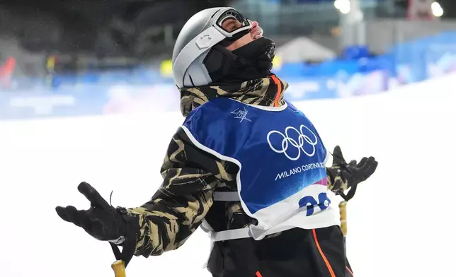 Switzerland's Fabian Boesch reacts during the men's freestyle skiing big air qualifications at the 2026 Winter Olympics, in Livigno, Italy, Sunday, Feb. 15, 2026. (AP Photo/Lindsey Wasson)
