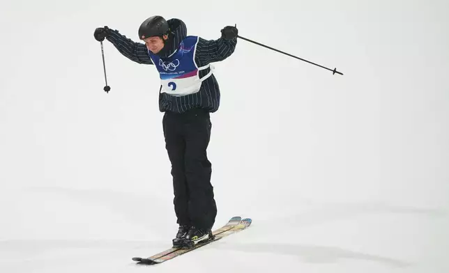 Norway's Birk Ruud reacts during the men's freestyle skiing big air qualifications at the 2026 Winter Olympics, in Livigno, Italy, Sunday, Feb. 15, 2026. (AP Photo/Lindsey Wasson)