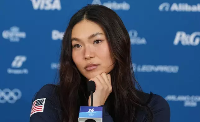 United States' Chloe Kim looks on during a press conference at the 2026 Winter Olympics, in Livigno, Italy, Monday, Feb. 9, 2026. (AP Photo/Lindsey Wasson)