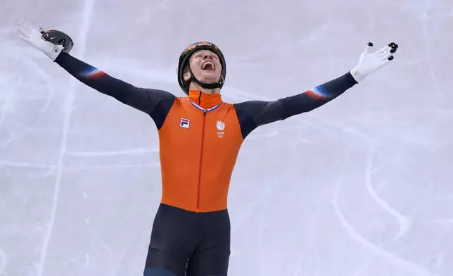 Jens van 't Wout of the Netherlands wins gold during the short track speed skating men's 1000m at the 2026 Winter Olympics, in Milan, Italy, Thursday, Feb. 12, 2026. (AP Photo/Stephanie Scarbrough)