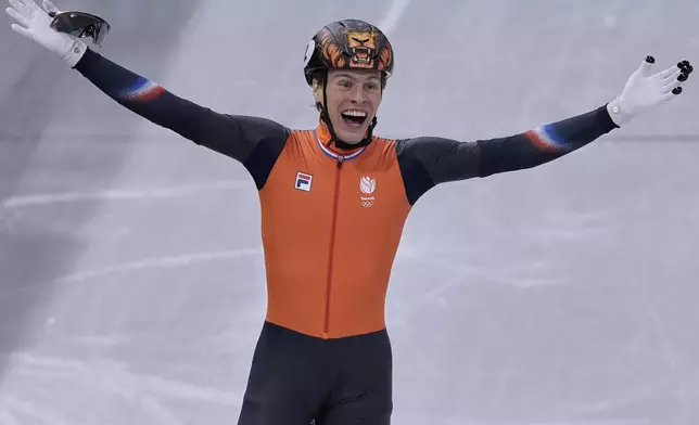 Jens van 't Wout of the Netherlands wins gold during the short track speed skating men's 1000m at the 2026 Winter Olympics, in Milan, Italy, Thursday, Feb. 12, 2026. (AP Photo/Stephanie Scarbrough)