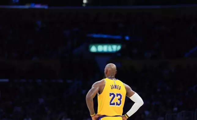 Los Angeles Lakers forward LeBron James (23) stands on the court during the first half of an NBA basketball game against the Golden State Warriors Saturday, Feb. 7, 2026, in Los Angeles. (AP Photo/Jae C. Hong)