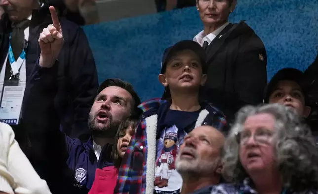 Vice President JD Vance visits a preliminary round match of women's ice hockey between United States and Czechia at the 2026 Winter Olympics, in Milan, Italy, Thursday, Feb. 5, 2026. (AP Photo/Petr David Josek)