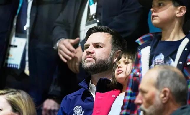 Vice President JD Vance, center, attends a preliminary round match of women's ice hockey between United States and Czechia at the 2026 Winter Olympics, in Milan, Italy, Thursday, Feb. 5, 2026. (AP Photo/Petr David Josek)