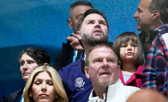 Vice President JD Vance, center, attends a preliminary round match of women's ice hockey between United States and Czechia at the 2026 Winter Olympics, in Milan, Italy, Thursday, Feb. 5, 2026. (AP Photo/Petr David Josek)