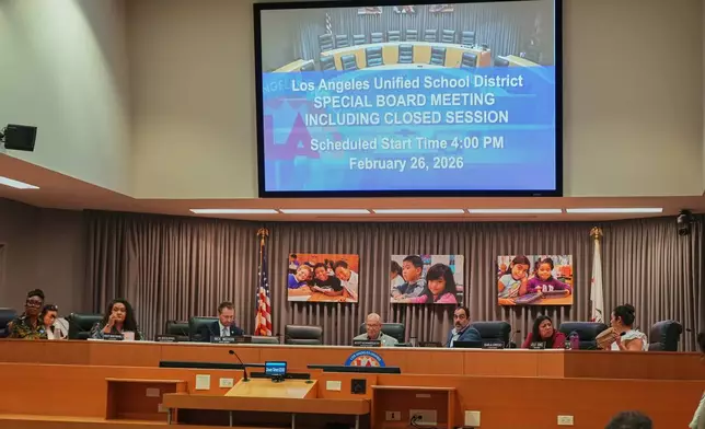 Los Angeles Unified School District board members listen to online public comments during a meeting at LAUSD headquarters before a special closed session with Superintendent Alberto Carvalho, Thursday, Feb. 26, 2026, in Los Angeles. (AP Photo/Damian Dovarganes)