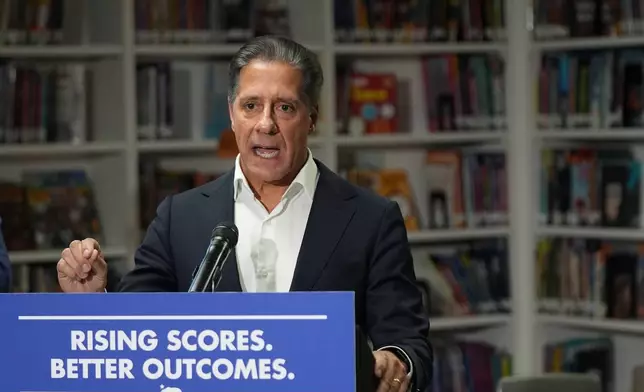 FILE - Alberto Carvalho, Superintendent of Los Angeles Unified School District speaks about students' improved rising scores before Gov. Gavin Newsom signed legislation related to student literacy in Los Angeles on Thursday, Oct. 9, 2025. (AP Photo/Damian Dovarganes, File)