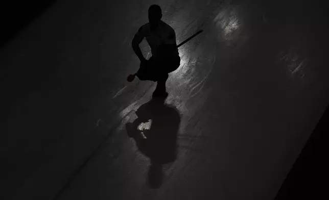 Canada's Brad Jacobs competes during a men's curling semifinal match against Norway at the 2026 Winter Olympics, in Cortina d'Ampezzo, Italy, Thursday, Feb. 19, 2026. (AP Photo/Bernat Armangue)