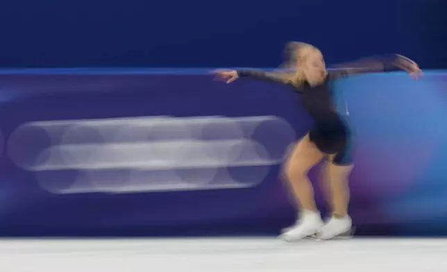 Amber Glenn of the United States competes during the women's figure skating free program at the 2026 Winter Olympics, in Milan, Italy, Thursday, Feb. 19, 2026. (AP Photo/Stephanie Scarbrough)