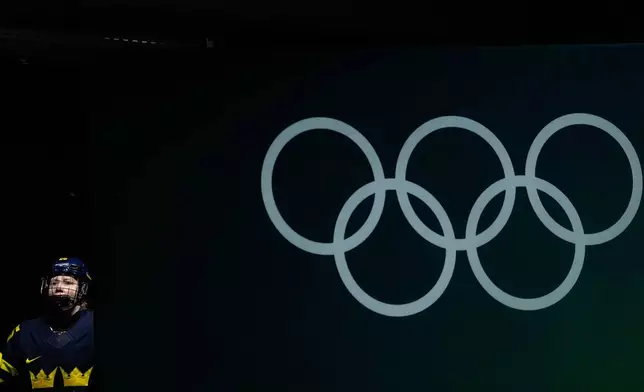 Sweden's Lina Ljungblom (25) arrives for the warm up ahead of a women's ice hockey bronze medal game between Switzerland and Sweden at the 2026 Winter Olympics, in Milan, Italy, Thursday, Feb. 19, 2026. (AP Photo/Petr David Josek)