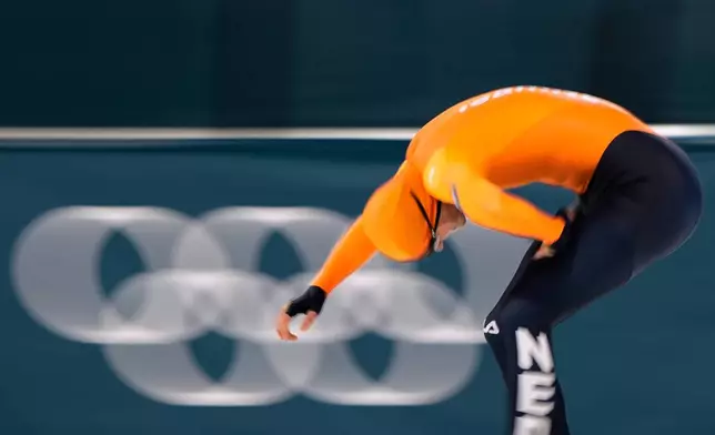 Joep Wennemars of the Netherlands crosses the finish line to take fourth place in the men's 1500 meters speedskating race at the 2026 Winter Olympics, in Milan, Italy, Thursday, Feb. 19, 2026. (AP Photo/Ben Curtis)