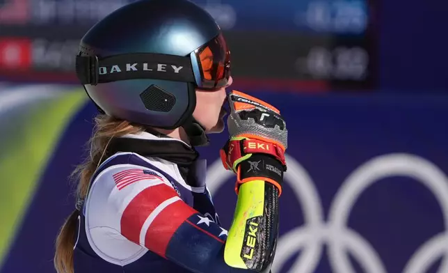 United States' Mikaela Shiffrin at the finish area of an alpine ski, women's giant slalom race, at the 2026 Winter Olympics, in Cortina d'Ampezzo, Italy, Sunday, Feb. 15, 2026. (AP Photo/Jacquelyn Martin)