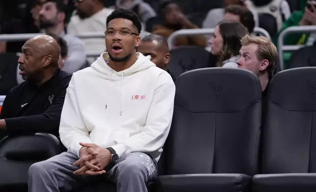 Milwaukee Bucks' Giannis Antetokounmpo sits on the bench during the first half of an NBA basketball game Wednesday, Feb. 4, 2026, in Milwaukee. (AP Photo/Morry Gash)