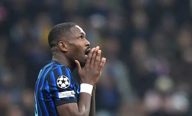 Inter Milan's Marcus Thuram reacts during the Champions League soccer match between Inter Milan and Bodø/Glimt, Tuesday, Feb. 24 , 2026 ,in Milan, Italy (Spada/LaPresse via AP)