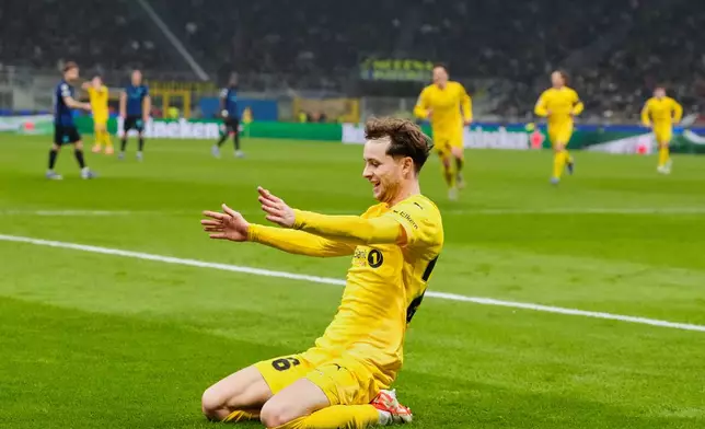 Glimt's Hakon Evjen celebrates after scoring his side's second goal during a Champions League playoff soccer match between Inter Milan and Bodo Glimt, at the San Siro stadium in Milan, Italy, Tuesday, Feb.24, 2026. (AP Photo/Luca Bruno)