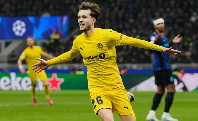 Glimt's Hakon Evjen celebrates after scoring his side's second goal during a Champions League playoff soccer match between Inter Milan and Bodo Glimt, at the San Siro stadium in Milan, Italy, Tuesday, Feb.24, 2026. (AP Photo/Luca Bruno)