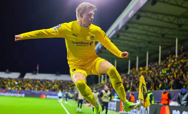 Bodø/Glimt's Jens Petter Hauge celebrates after scoring against Inter Milan during a Champions League soccer match, Wednesday, Feb 18, 2026, in Bodo, Norway. (Thomas Andersen/NTB Scanpix via AP)