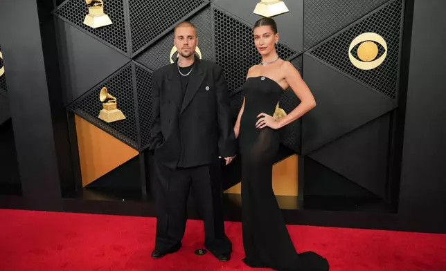 Justin Bieber, left, and Hailey Bieber arrive at the 68th annual Grammy Awards on Sunday, Feb. 1, 2026, in Los Angeles. (Photo by Jordan Strauss/Invision/AP)