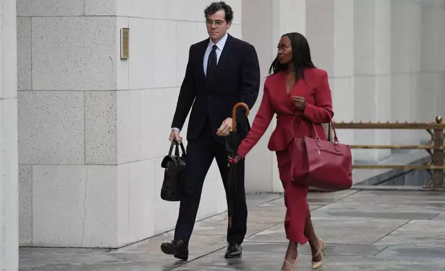 Adam Mosseri, CEO of Instagram, arrives in court to testify in a landmark social media case that seeks to hold tech companies responsible for harms to children, Wednesday, Feb. 11, 2026, in Los Angeles. (AP Photo/Damian Dovarganes)