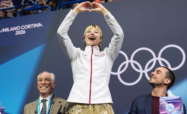 Alysa Liu of the United States reacts to her score after competing in the women's figure skating free program at the 2026 Winter Olympics, in Milan, Italy, Thursday, Feb. 19, 2026. (AP Photo/Stephanie Scarbrough)